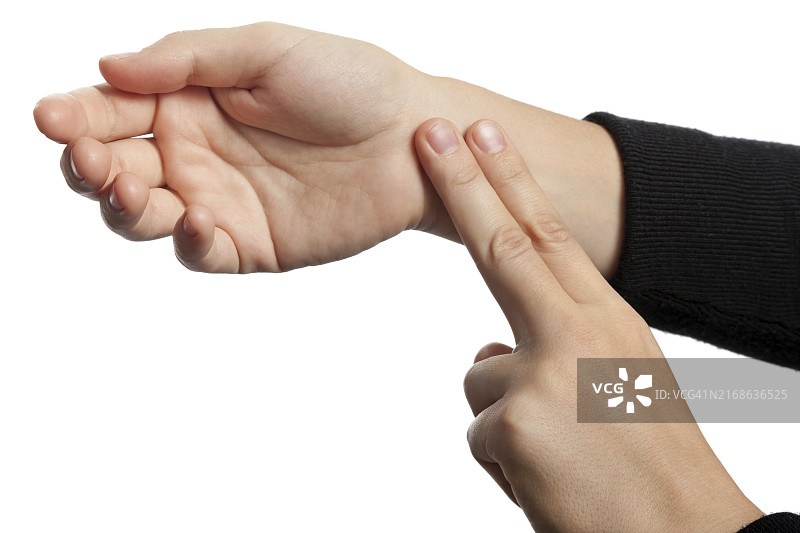 测量手臂脉搏的医疗保健图片素材