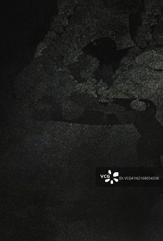具有黑暗阴影的抽象纹理图像，营造出神秘而怪异的氛围图片素材