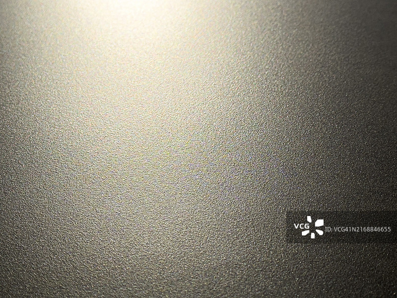 强光下略不规则的闪光表面图片素材