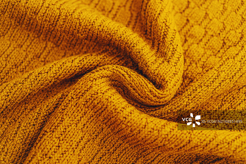 黄色针织毛衣纹理，扁平风格特写图片素材