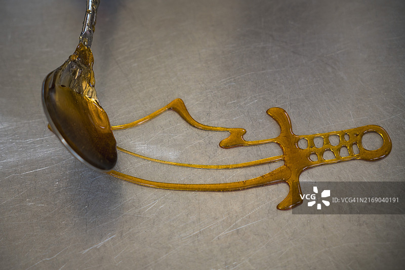 广州非物质文化遗产手工食品糖画图片素材