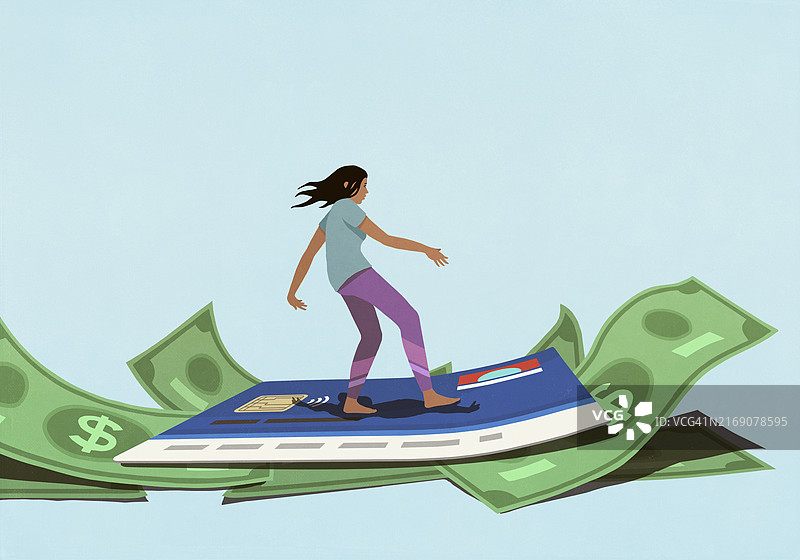 女子在现金浪潮上冲刷信用卡债务图片素材