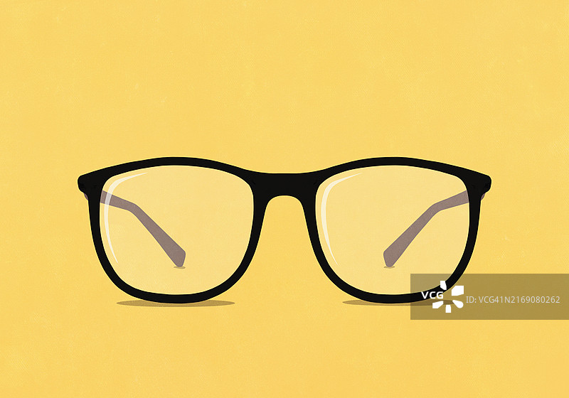 黄色背景上的大眼镜图片素材