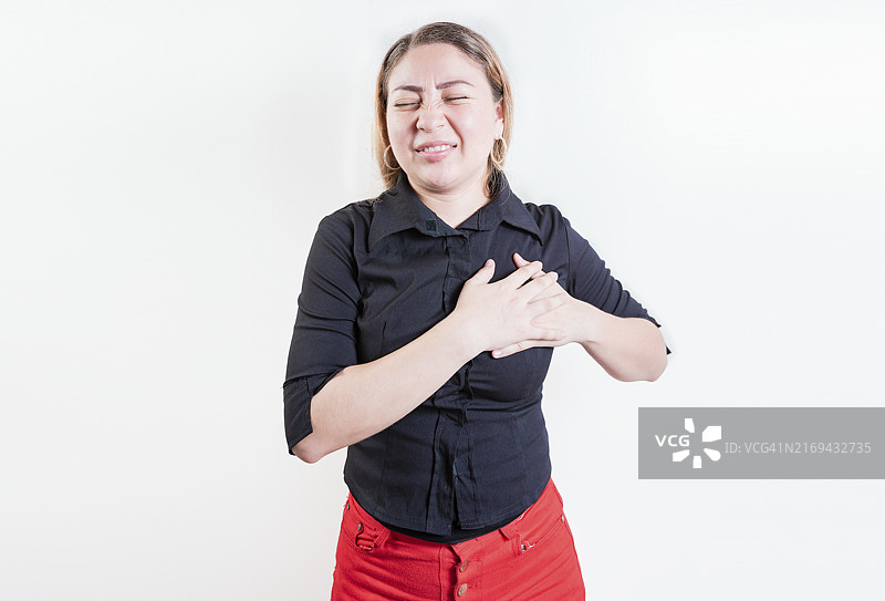 心脏不适的拉丁裔女性图片素材