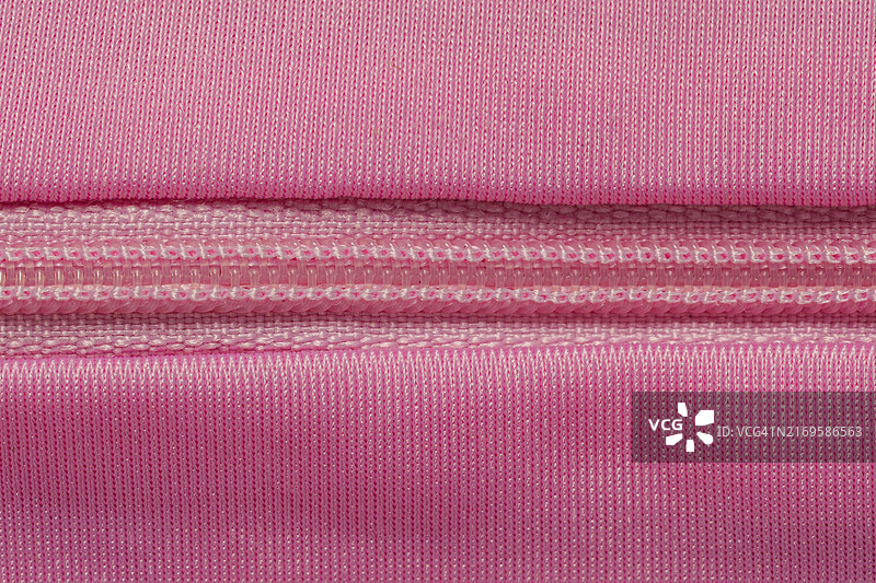 带拉链的粉色织物图片素材