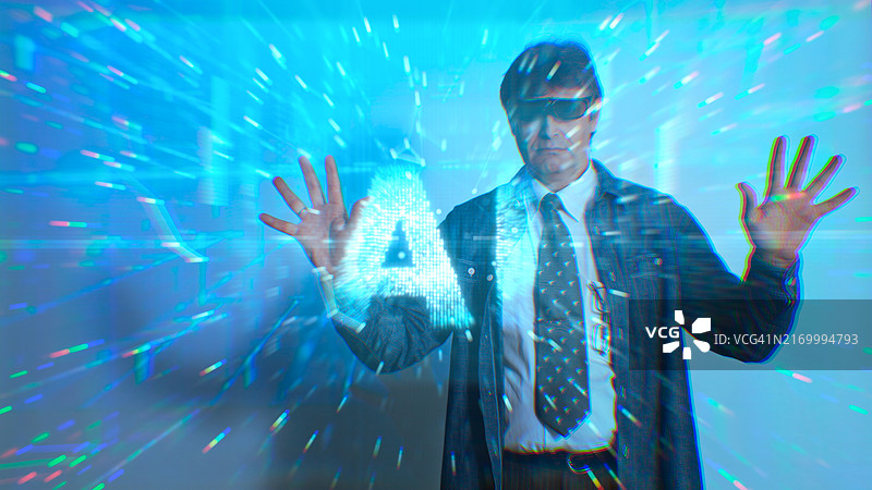 商务男士使用AR眼镜和AI助手来分析数据图片素材