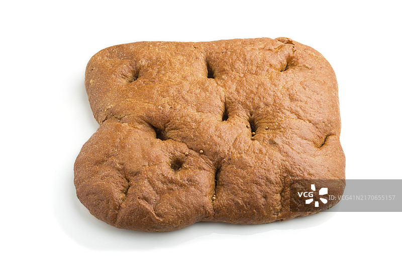 白色背景下的新鲜自制面包特写图片素材