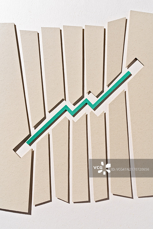 纸上的绿色上升曲线图图片素材