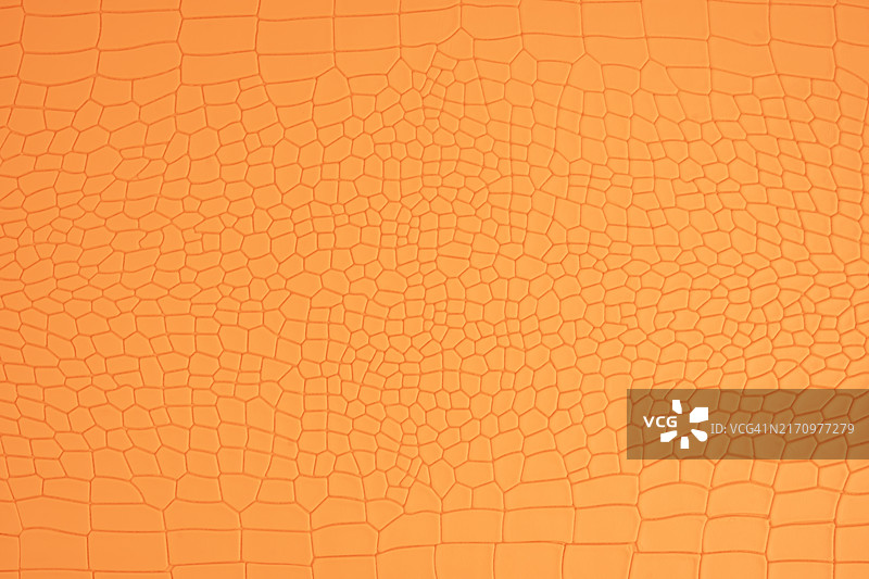 橙色鳄鱼皮革纹理背景特写图片素材