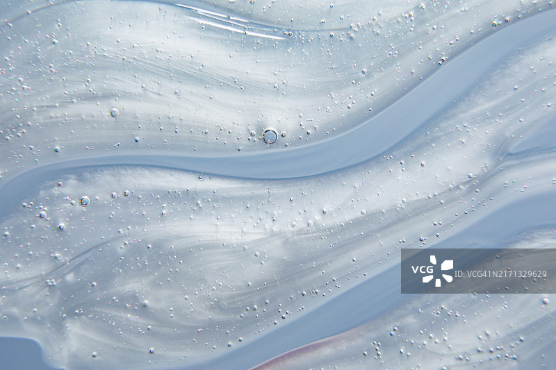 带气泡的凝胶霜或精华液纹理，润肤露，保湿霜，皮肤护理背景图片素材