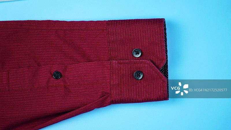 红色长袖衬衫袖口特写图片素材