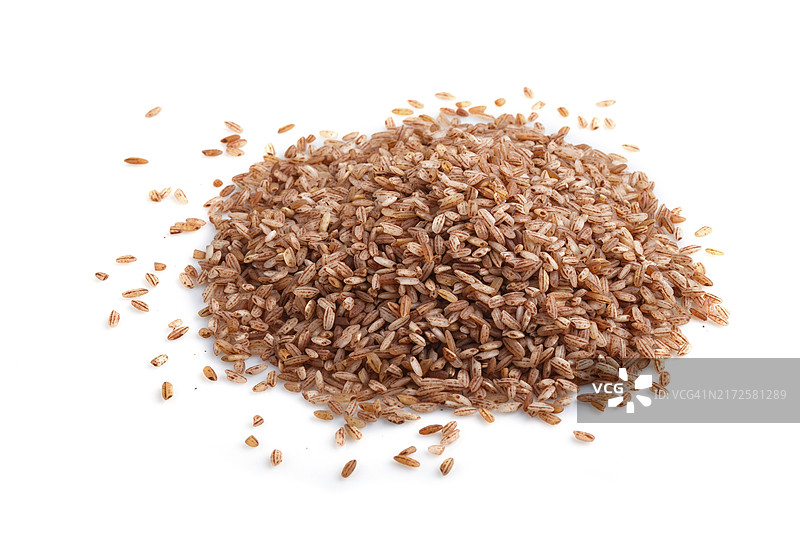 白色背景上的一堆未抛光的糙米图片素材