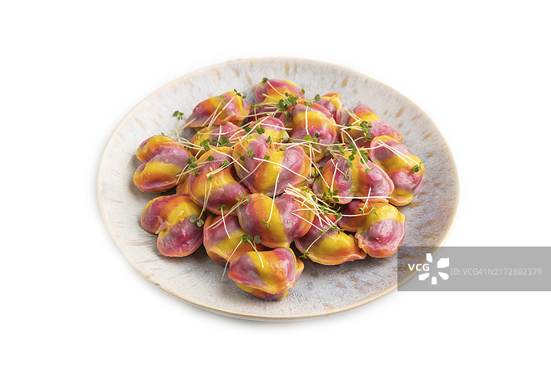 彩色饺子配胡椒和香草图片素材