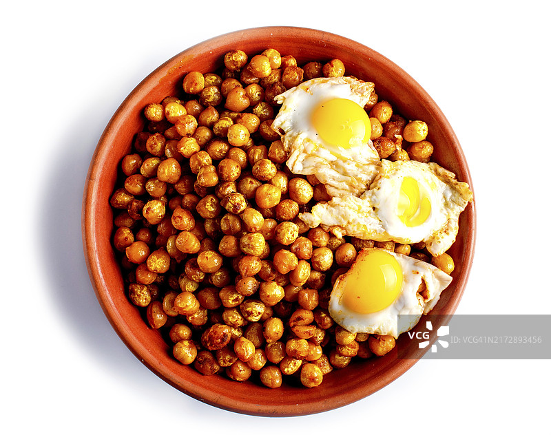 鹌鹑蛋香料炸鹰嘴豆泥土盘俯视图图片素材