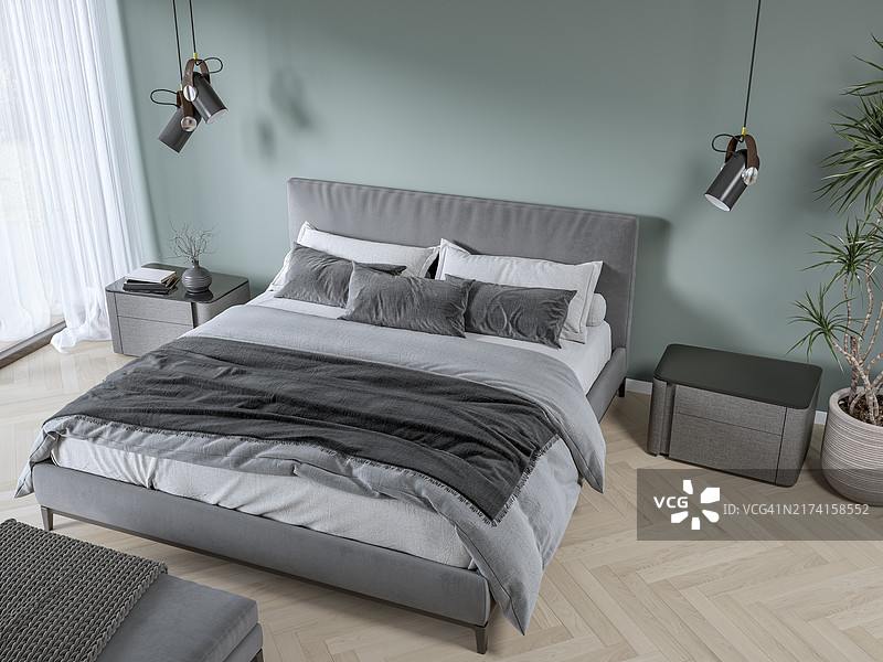 豪华卧室，床在薄荷绿墙前，有窗户和装饰（高角度）图片素材