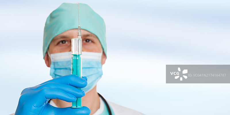 新冠病毒疫苗注射器，医生，新冠疫苗接种，德国图片素材