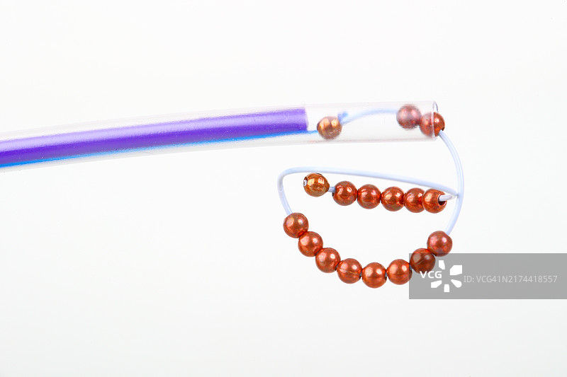 宫内节育器，带导管的铜珠球图片素材