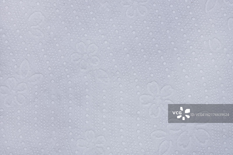 带有压纹花朵的餐巾纸特写图片素材