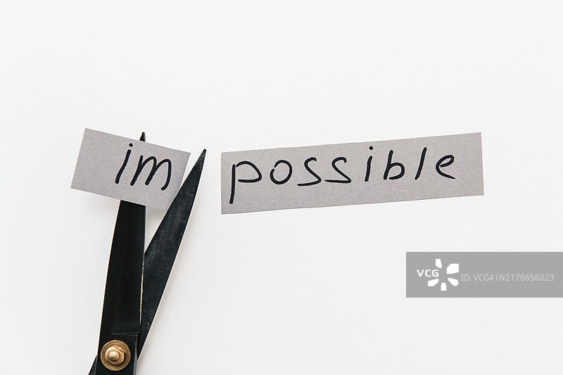 剪刀与“impossible”字样图片素材