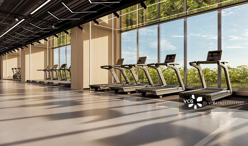 现代健身房的跑步机侧视图图片素材