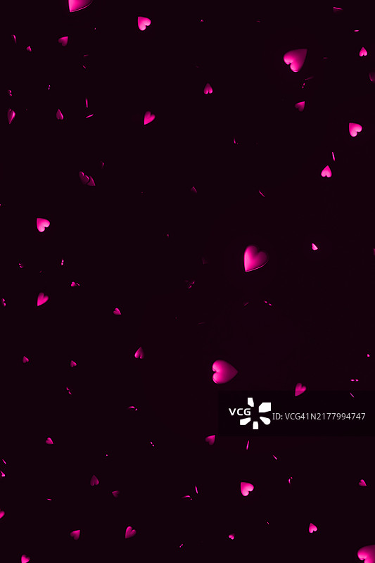 深色背景上漂浮的彩色粉色心形，营造浪漫的庆祝或爱情表达氛围。情人节设计的明亮节日背景图片素材