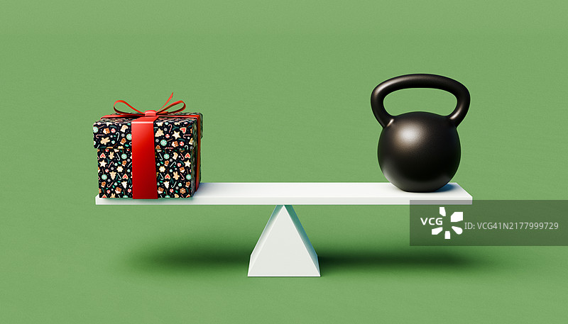 带有重物和圣诞礼物的跷跷板图片素材