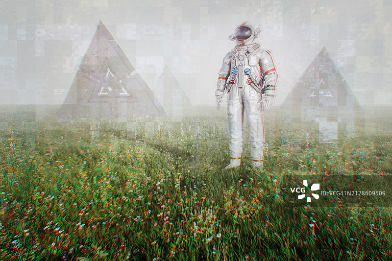 宇航员站在奇幻景观中图片素材