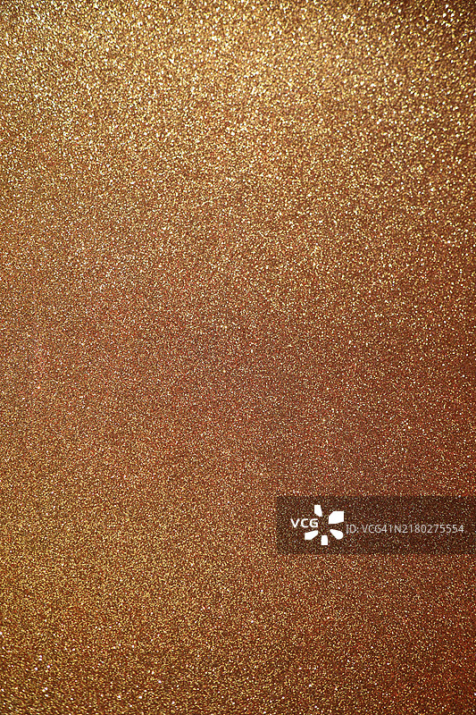 金色闪光背景，圣诞节闪亮的节日壁纸图片素材