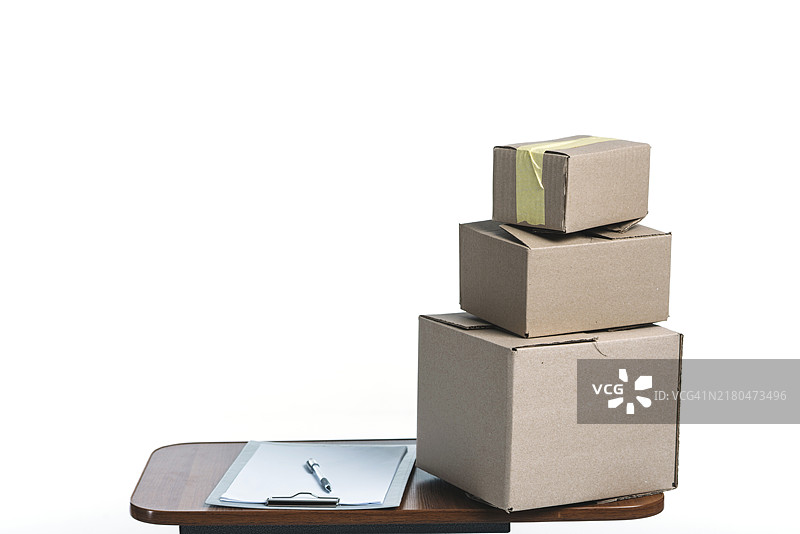 包裹、剪贴板和桌子图片素材