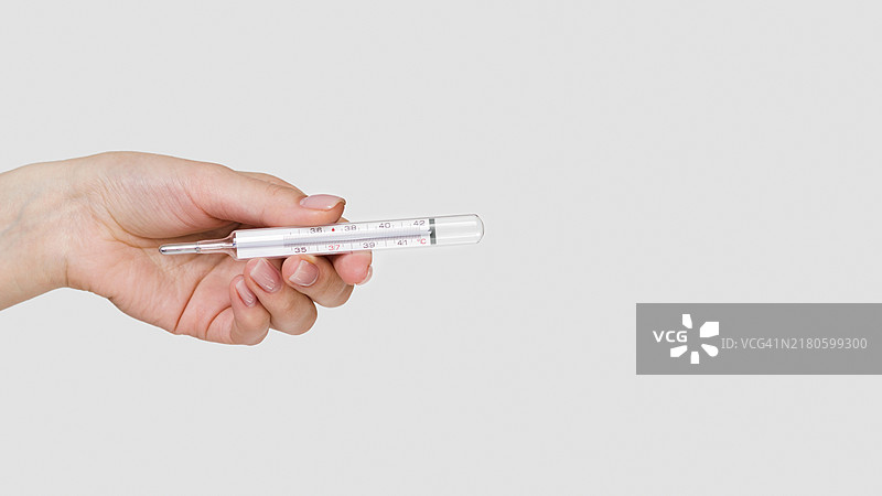 手持温度计特写图片素材