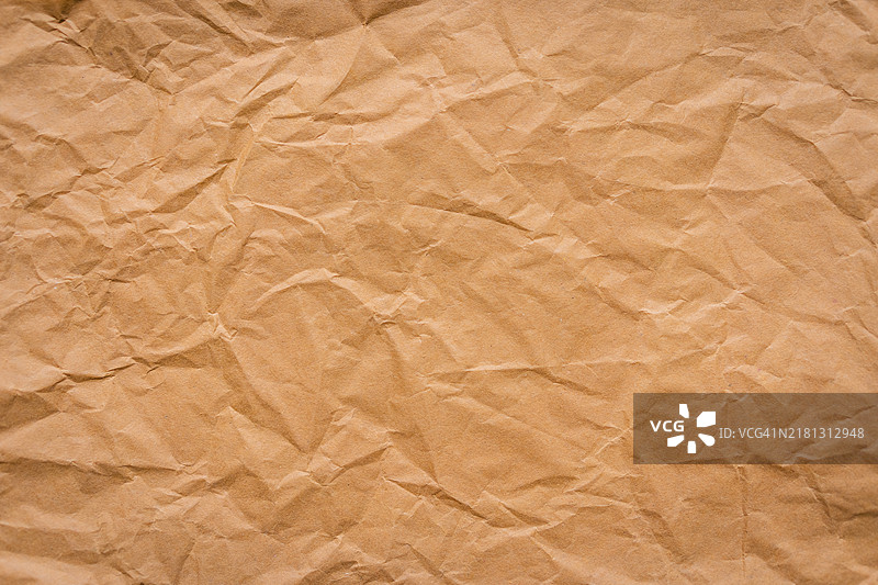 棕色皱纹纸纹理背景。环保项目再生纹理图片素材