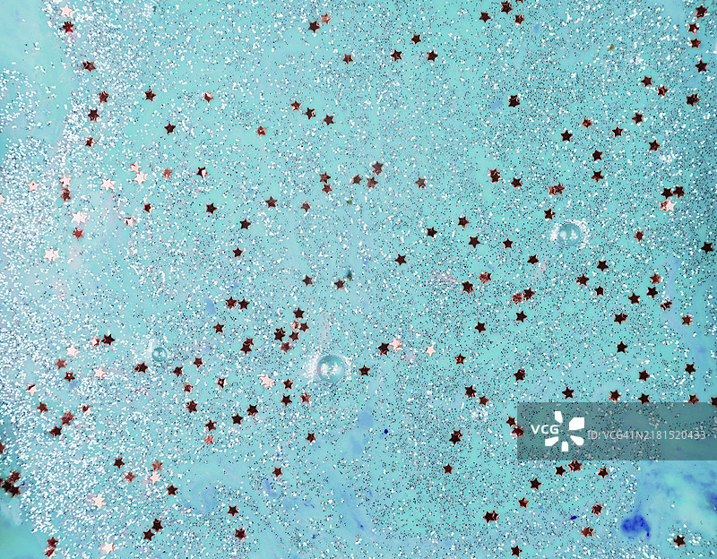 带有星光点缀的彩绘绿松石色水图片素材