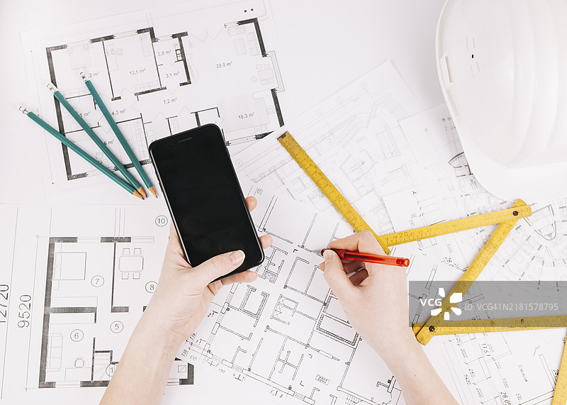 建筑概念与建筑平面图智能手机图片素材