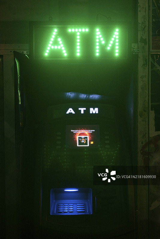 ATM机霓虹灯变换货币符号图片素材