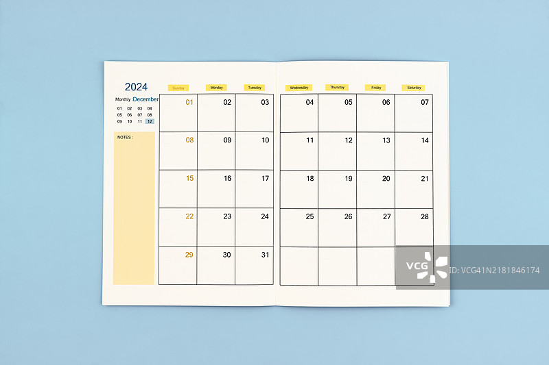 2024年12月蓝色背景月度计划表图片素材