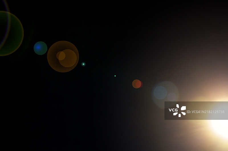 背景图像，带有光的圆形折射效果图片素材