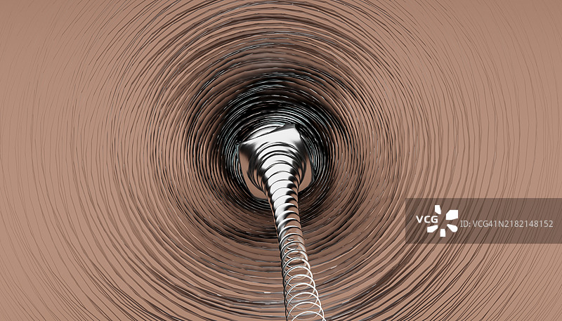 金属漩涡的正面视图，前景是动态曲线的抽象背景图片素材