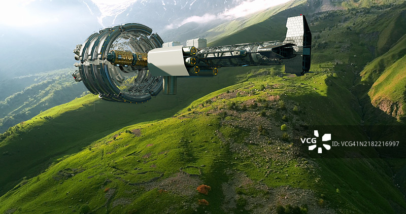 一艘未来派飞船悬浮在绿色山丘上图片素材