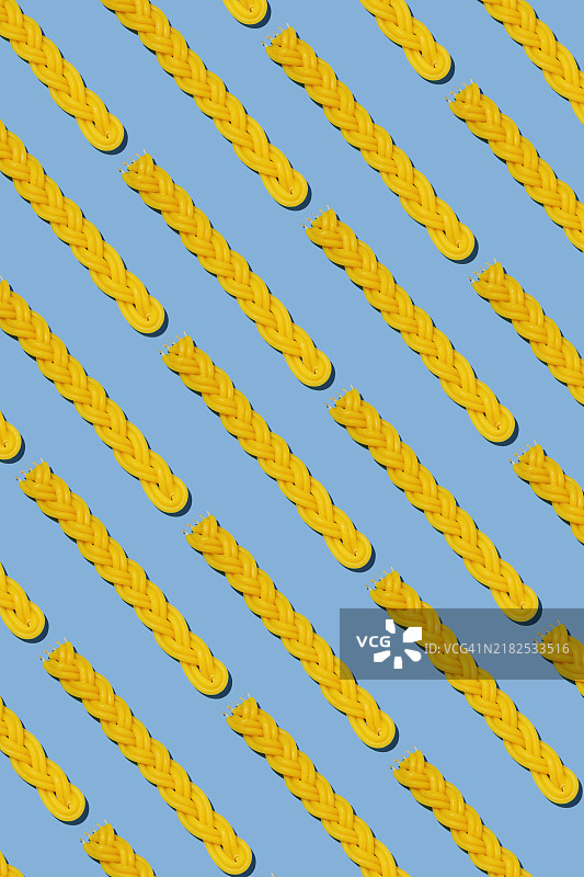 蓝色背景上的重复哈夫达拉蜡烛图片素材