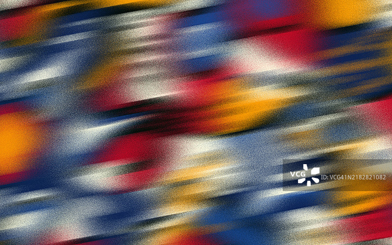 模糊的抽象图案，充满生动的红色、蓝色和黄色。动态的抽象图案，模糊的颜色呈现出鲜艳的红色、蓝色、黄色和白色，营造出运动效果。图片素材