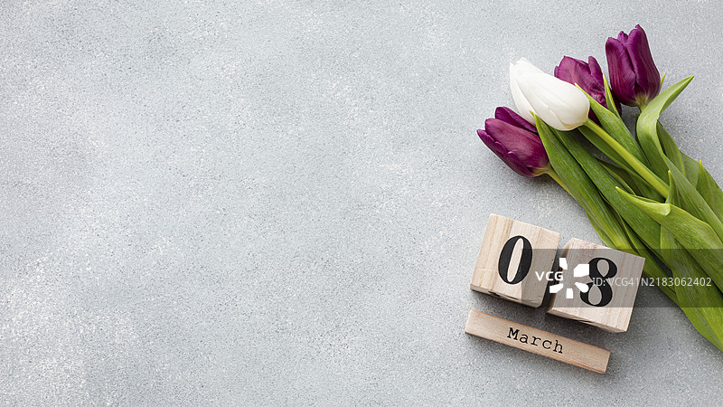 三八妇女节的郁金香花束与留白文字图片素材