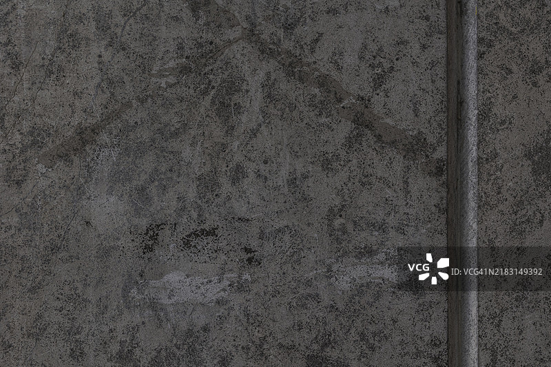 灰色墙壁上的金属管特写图片素材