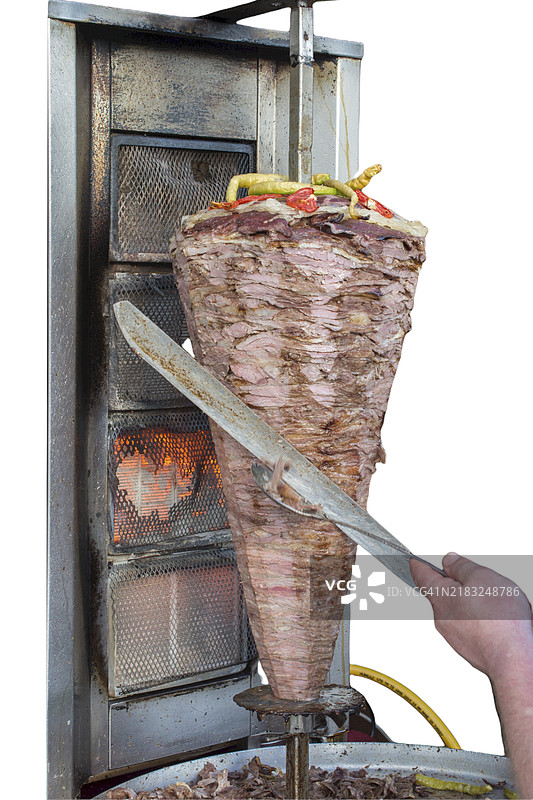 垂直烤肉串，用于土耳其街头食品旋转烤肉。图片素材