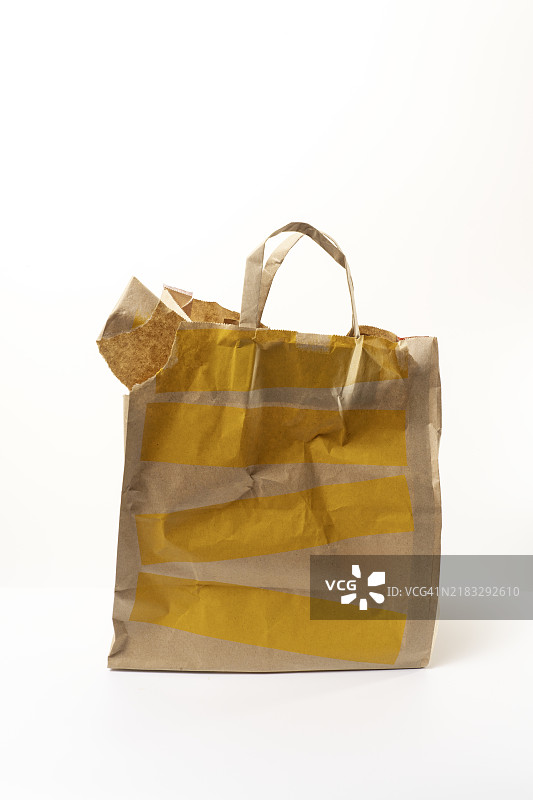 可重复使用的棕色一次性纸袋，已损坏图片素材
