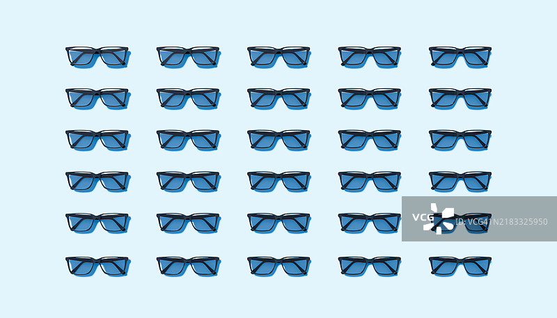 折叠阅读眼镜的网格图案，背景为浅蓝色图片素材