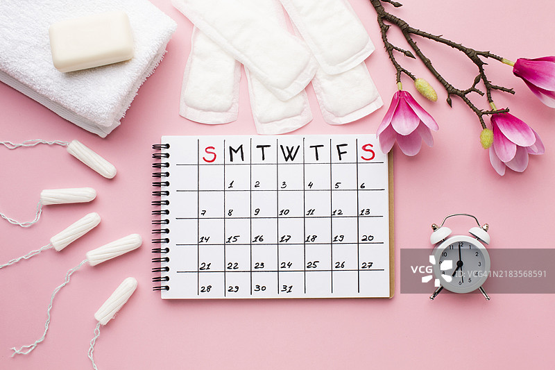 月经日程与闹钟图片素材