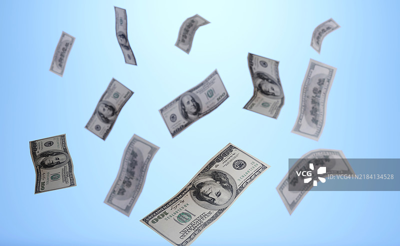 飞翔的100美元钞票图片素材