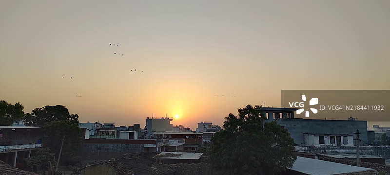 High angle view of buildings against sky during sunrise图片素材