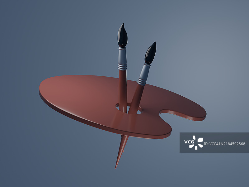 两个画笔放在红色调色板上图片素材