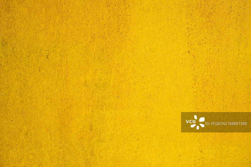 黄色水泥墙的全景拍摄。图片素材